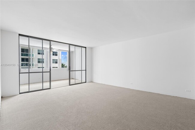 Building Photo - 5005 Collins Ave