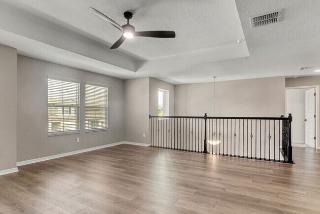 Building Photo - Discover luxury living in the gated Whispe...