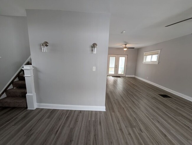 Building Photo - Welcome home to a spacious 4-Bedroom Home ...