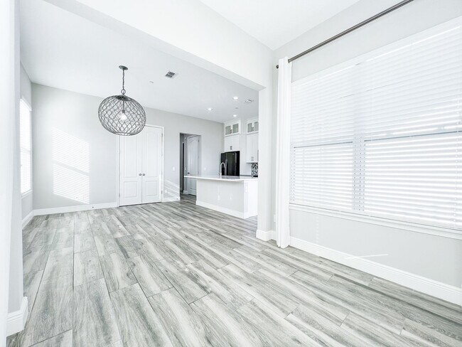 Building Photo - Luxury 4-Bedroom Townhome in Laureate Park – Now Available!