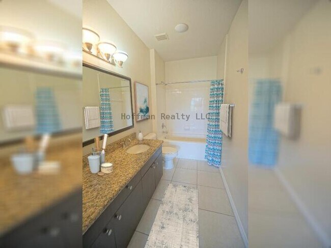 Building Photo - Beach Walk Condo | 2BR/2BA with Bay Views