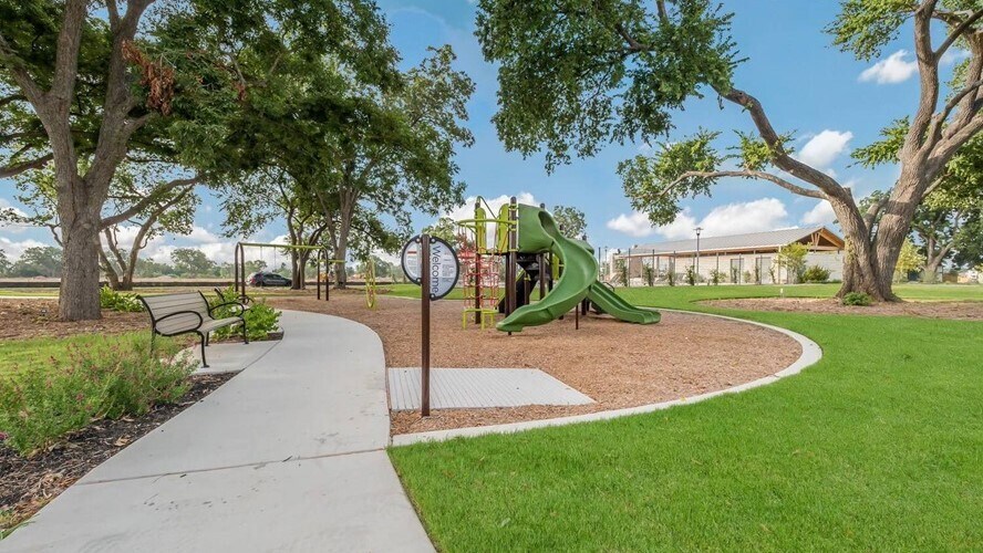Community Playscape and pocket park - Photo credit TM Homes - 12112 Coyote Call Way