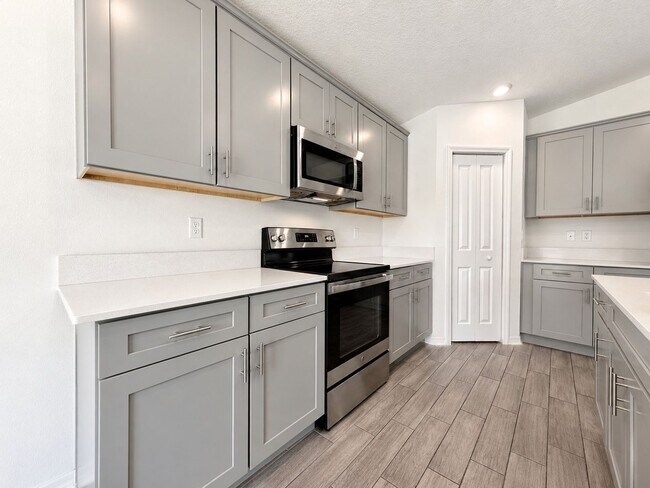 Building Photo - Live exceptionally in this 4Bedroom / 2Bath home in Daytona’s Preserve at LPGA!