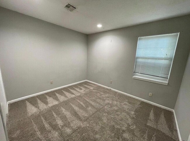 Building Photo - 10235 W 86th Ter