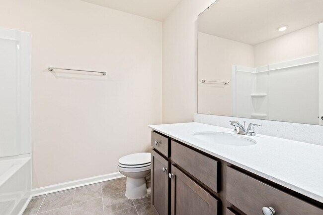 Building Photo - Like-New Townhome Walk to Downtown | Garage + Internet Included