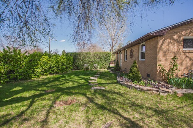 Building Photo - New Finishes in this Home on a Large Lot with Covered Parking and AIR CONDITIONING! MOVE IN READY!