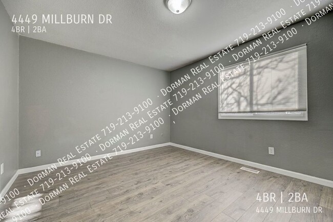 Building Photo - Four bedroom home close to Ft. Carson, Lar...