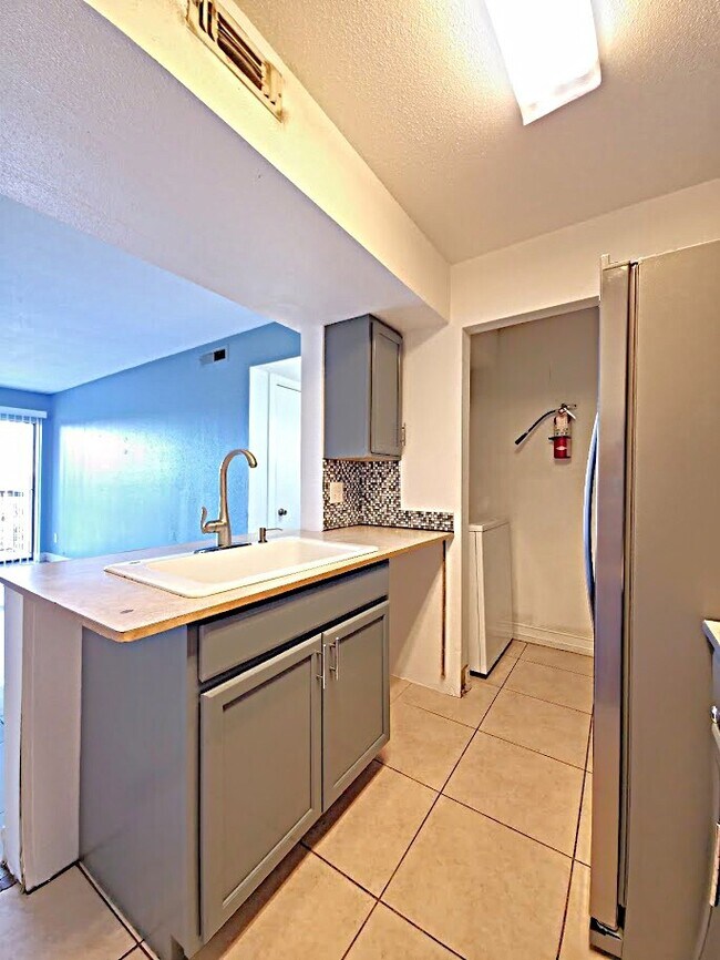 Building Photo - Beautiful 1 Bedroom + Den at Village Creek
