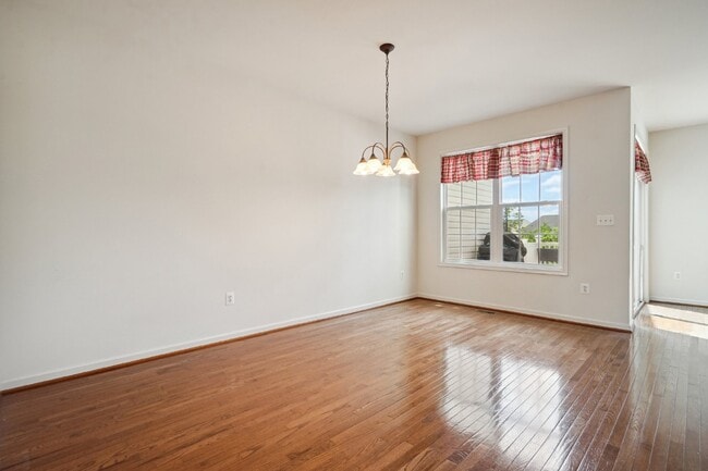 Building Photo - This beautiful townhome spans three finished levels and over 2800 square feet.