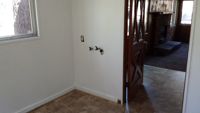 Building Photo - Rustic three bedroom with large lot.