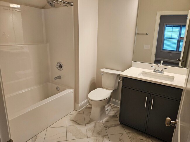 Building Photo - Unfurnished 4 bedroom, 3.5 bath Hampstead home in Magnolia Reserves Community