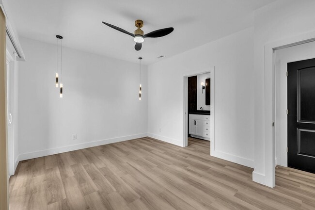 Building Photo - Modern New Construction Townhome with Roof...