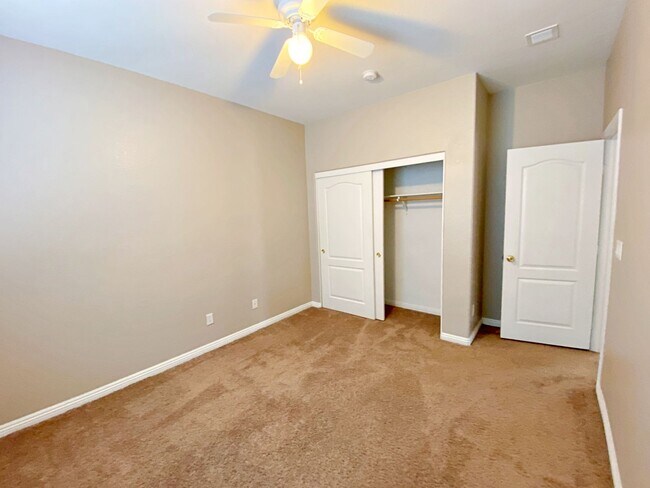 Building Photo - 4 BEDROOM HOME 3 CAR GARAGE ON A CORNER LO...
