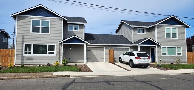 Building Photo - MOVE IN SPECIAL! New Construction Duplex i...
