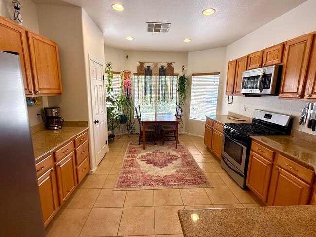 Building Photo - Single-Story Home with Solar, 3-Car Garage & Covered Patio