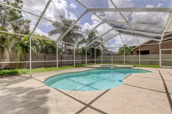 Building Photo - 9401 Woodbay Dr