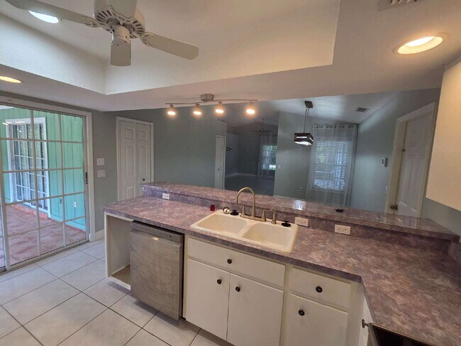 Building Photo - "Charming 2-Bed, 2-Bath North Port Retreat with Gleaming Hardwood Floors!"