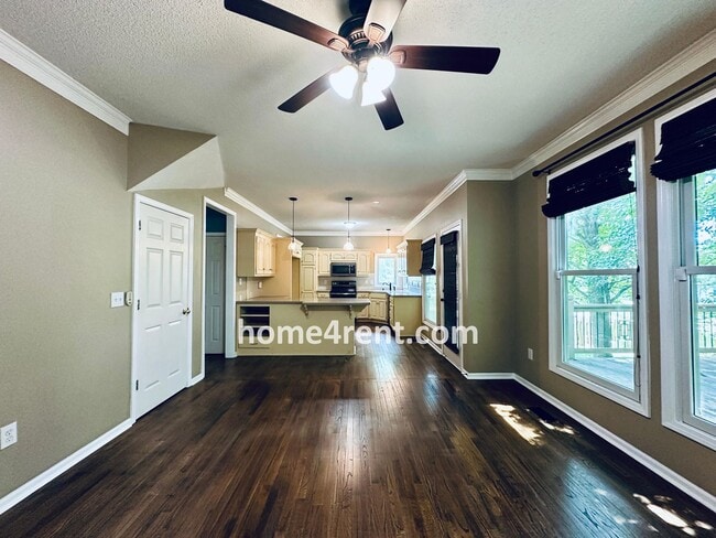 Building Photo - Blue Valley Schools w/ Wood Floors, Finished Basement and a Peaceful, Private Fenced Yard!