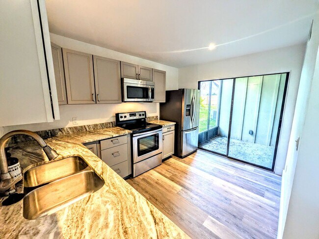 Building Photo - Annual UNfurnished renovated ground floor ...