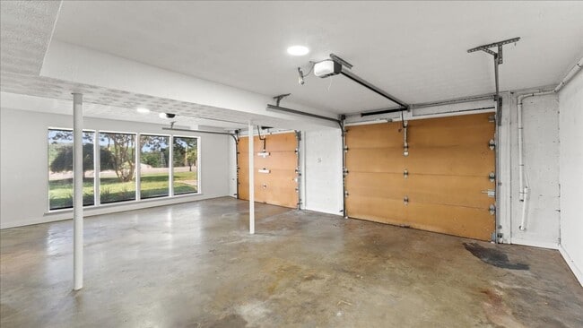 Building Photo - Renovated Mid-Century Modern Home in Belmont West with Finished Basement & Fenced Yard