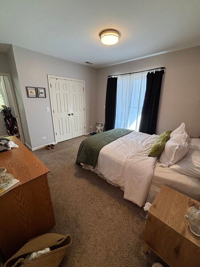 Primary bedroom with ensuite bath and private deck - 1241 N Maplewood Ave