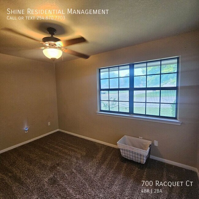 Building Photo - 700 Racquet Ct