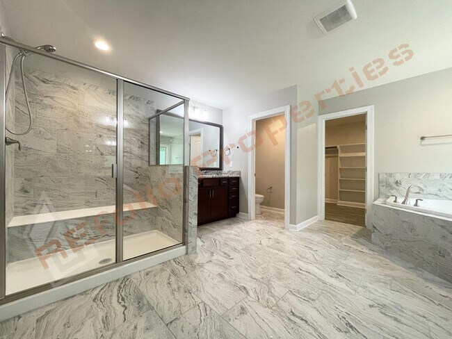 Building Photo - Gorgeous 5 Bedroom Home with First Floor In-law Suite & 3 Car Garage, Golf Course, Pool, Tennis a...