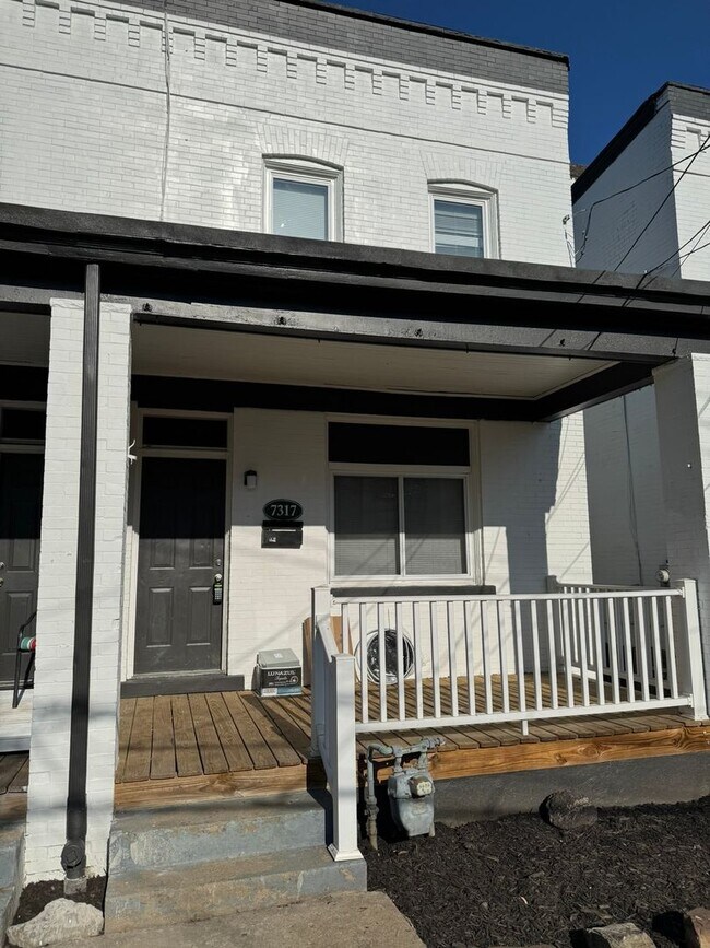 Building Photo - 7317 Woodlawn Ave