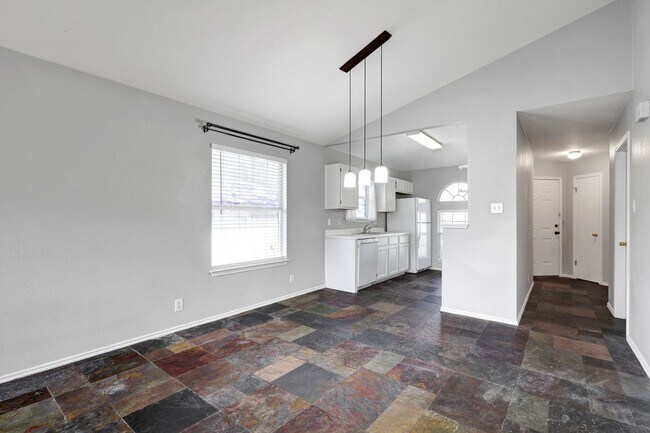Building Photo - Carpet-Free Home with High Ceilings & Outdoor Retreat