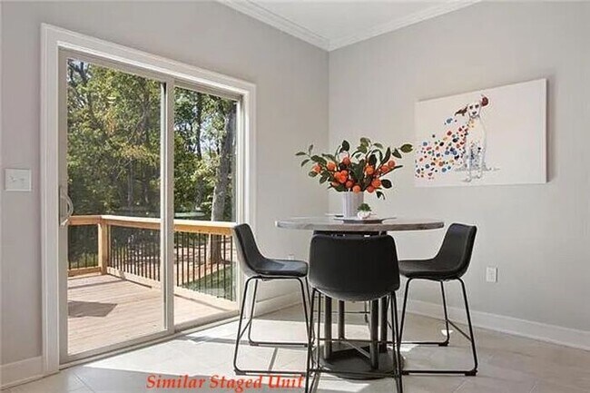 Building Photo - Stunning and Bright 3BR 2.5BA Townhome w/ 2-Car Garage • Quartzite Kitchen • Deck in Parkville