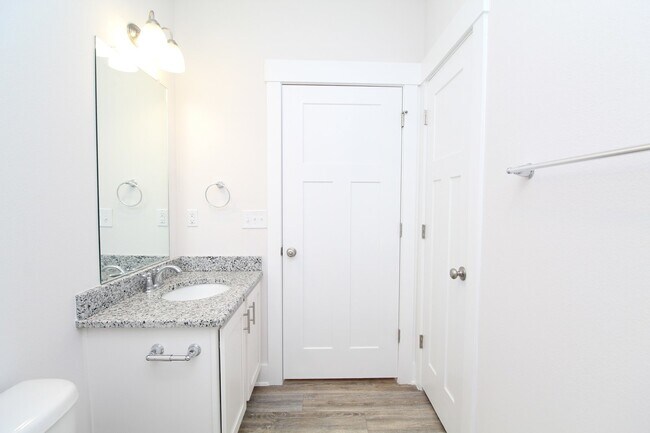 Building Photo - Don’t Miss This 4BR Home — 3-Car Garage, Modern Interior, Open Layout & Community Pool in Prime 9...