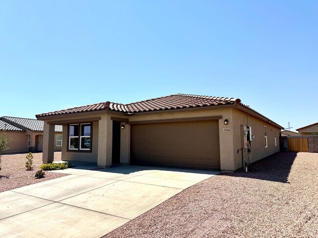 Building Photo - Spacious 4 Bedroom Home with Solar & Moder...