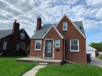 Building Photo - Charming Brick Bungalow w/ basement and detached garage