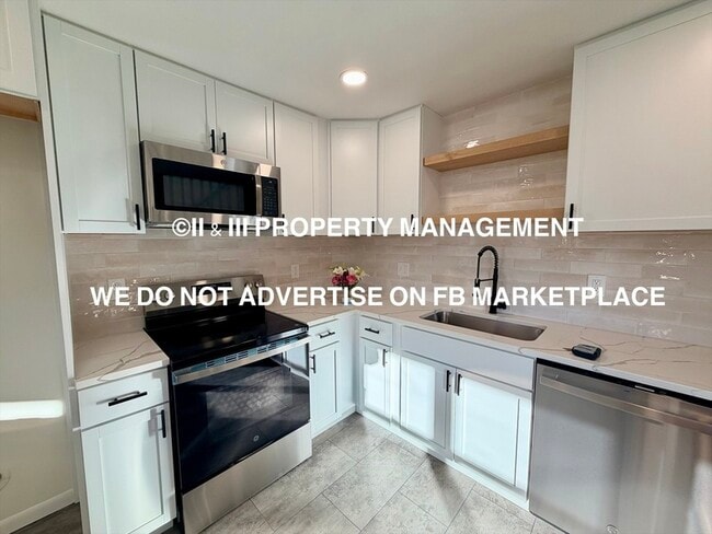 Building Photo - 3208 W 42nd Ave