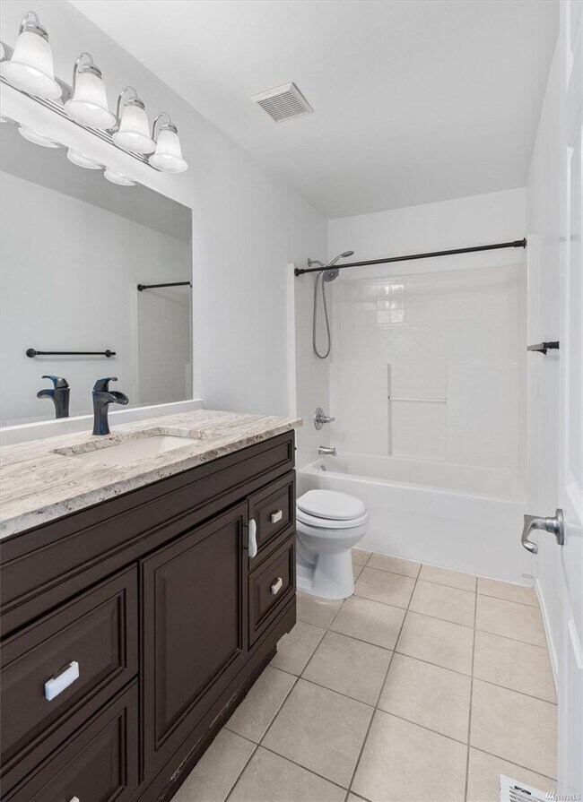 Building Photo - Spacious 4-Bedroom Home with Scenic Views & Versatile Living Spaces