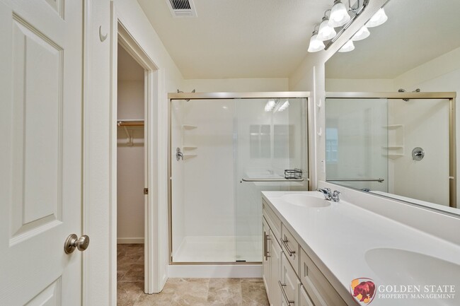 Building Photo - Modern 2-Bed Condo with Tesla Charger & At...