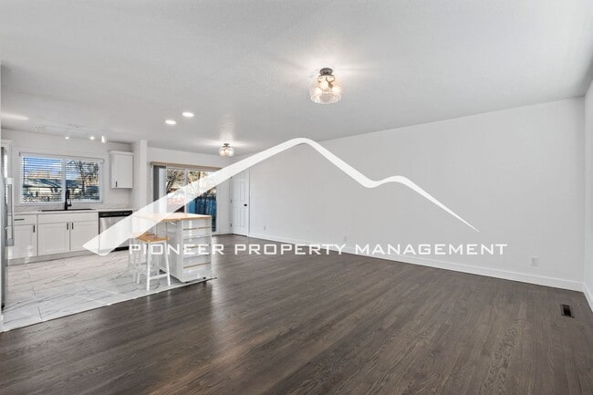 Building Photo - Stylishly Renovated Home with Enclosed Fence, AC and 1 Car Garage