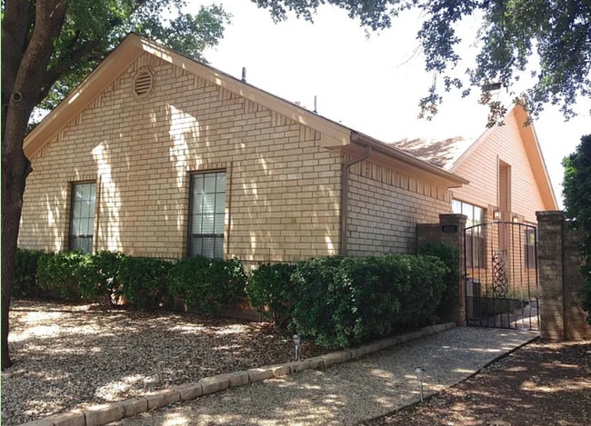 Front of Home is beautifully landscaped for easy maintenance. This home has great updates. - 4430 Winterberry Ln