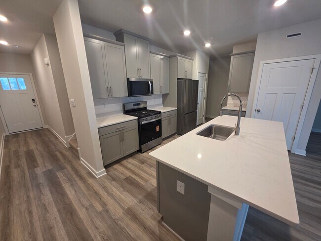 Building Photo - Luxury 4-Bedroom Townhome with Finished Walkout Basement & River Views