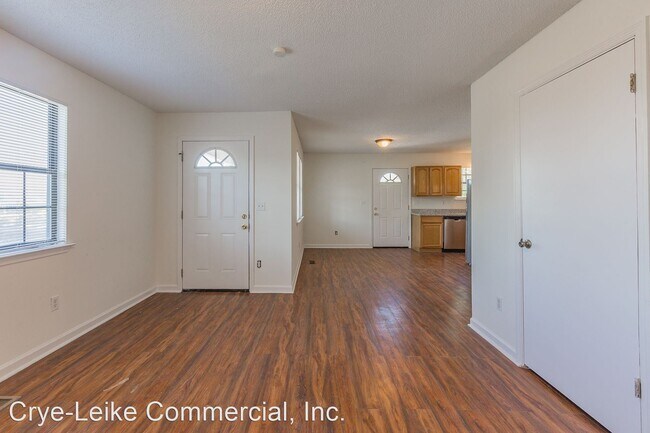 Building Photo - 4 br, 1.5 bath House - 1403 East 5th St.