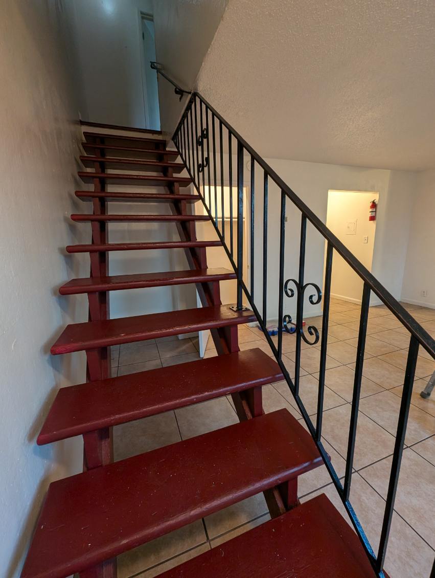 Stairway in downstairs living room - 251 Coventry Dr