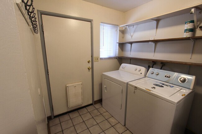 Building Photo - *LEASE TAKEOVER* Single Level 2BR Flagstaff Home | Fenced Yard & In-Unit Laundry
