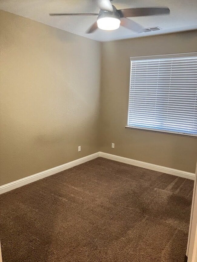 Building Photo - Spacious 4-Bedroom, 2-Bath Rental Home – M...