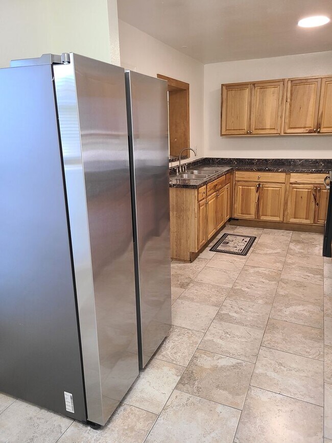Building Photo - Stunning Corner-Lot Rental: 4BR/2BA with Courtyard