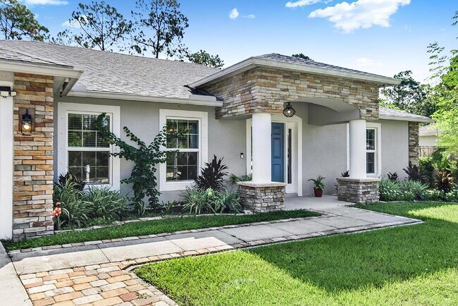 Building Photo - Modern 4-Bedroom, 3-Bath Home with Private In-Law Suite – Palm Coast, FL