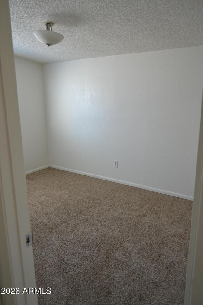 Building Photo - 1551 E 28th Ave