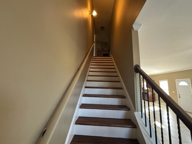 Building Photo - This property blends ample living space and storage with functional amenities.