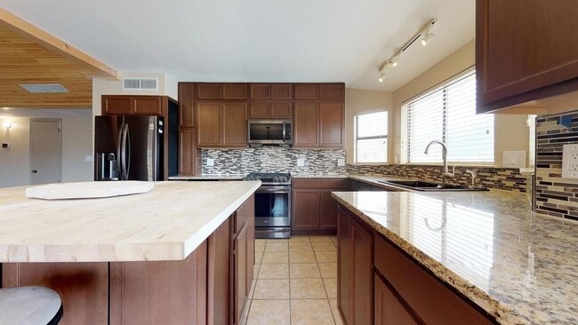 Building Photo - Northeast El Paso 5bed Refrig A/C house in...
