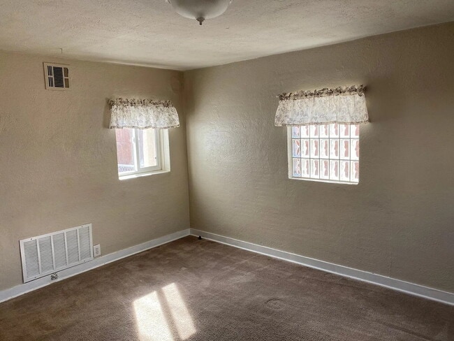 Building Photo - Charming 1-Bed 1-Bath Wheatridge Duplex with Private Fenced Yard & Garage - Available Now!