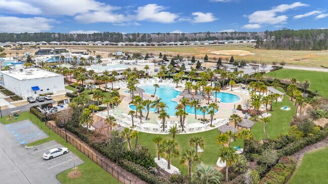 Building Photo - "Charming 2-Bedroom Retreat with 2 Baths and Den - 1558 Sq. Ft. of Comfort in Latitude Margaritav...